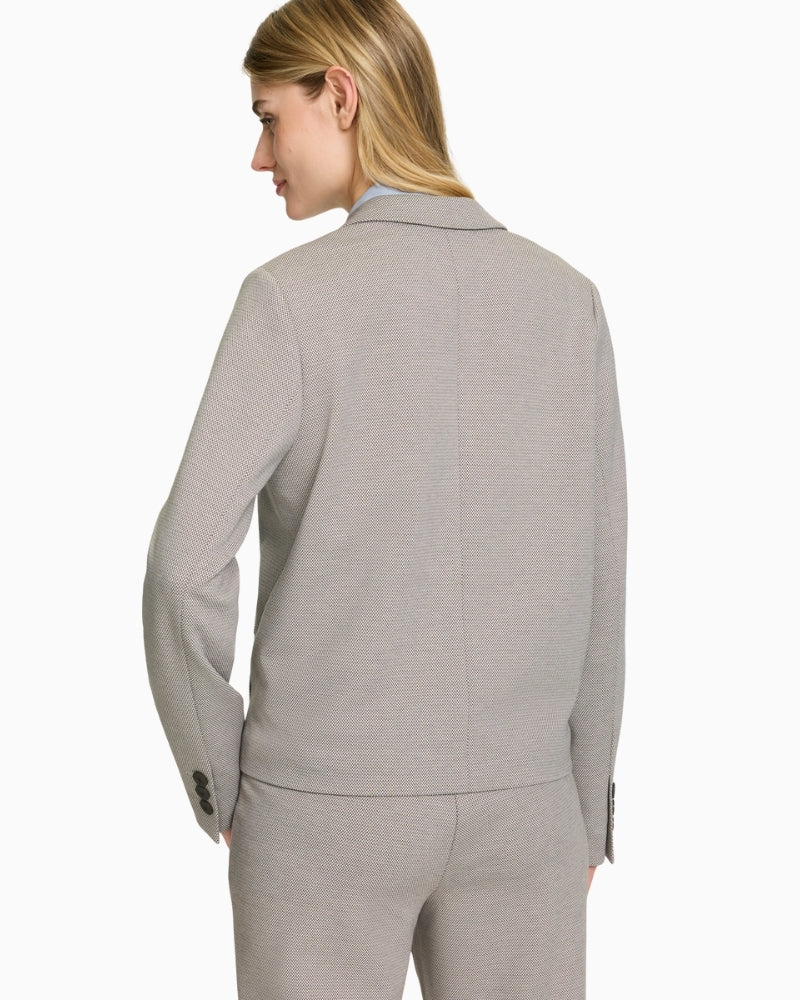 Back view of Olsen lapel jacket showing clean tailored lines