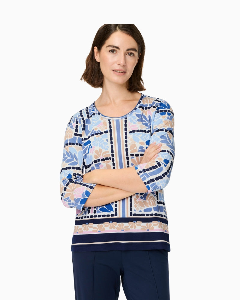 Woman wearing Olsen blue multi printed cotton top front view – Áines Boutique