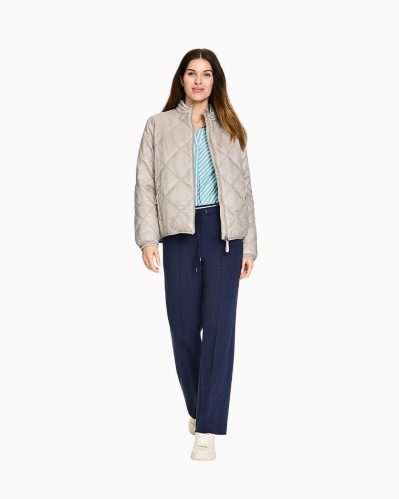 Olsen Anna Wide navy trousers with tie waist paired with Olsen quilted jacket