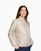 Side view highlighting zipped pockets and flattering fit