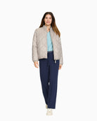 Olsen beige quilted jacket with zip closure paired with Olsen Anna WIde Trousers