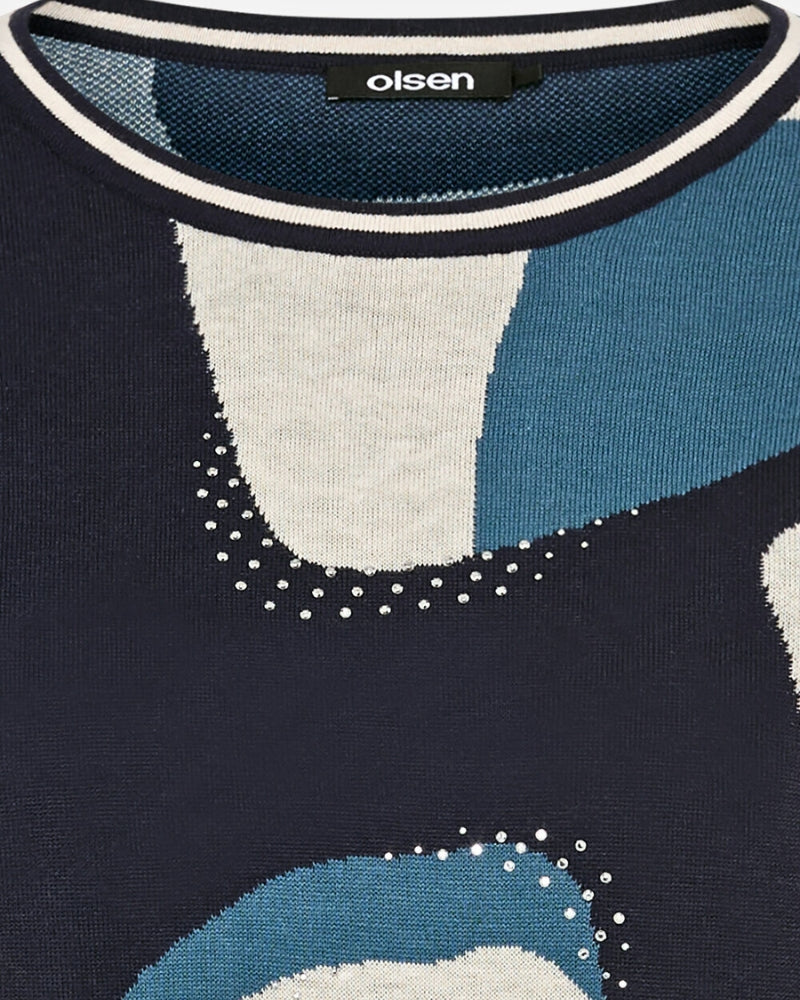 Close-up of round neckline and soft graphic pattern on Olsen cotton jumper