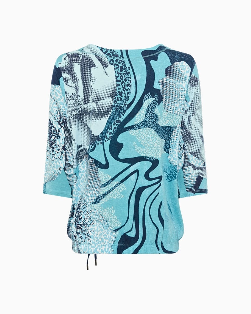 Back view of relaxed Olsen top with 3/4 sleeves and drawstring hem