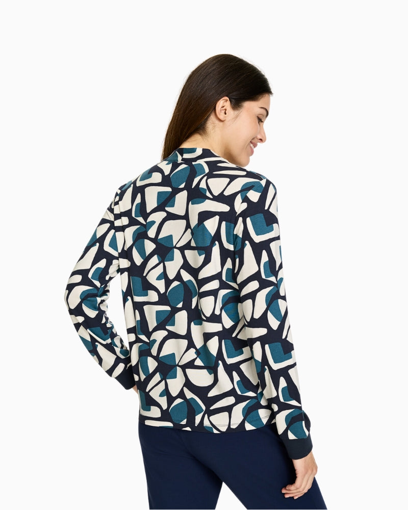 Side view of Olsen Hannah fit printed top styled casually