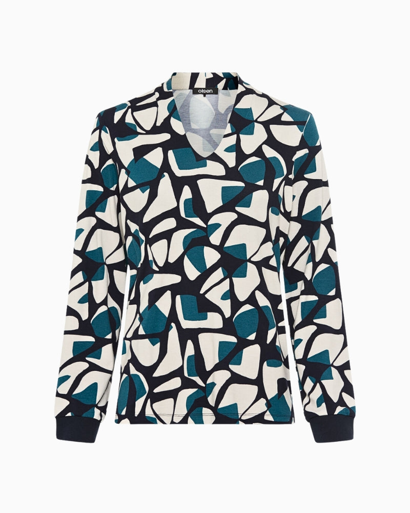 Long sleeve V-neck top in navy worn with classic trousers