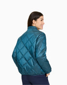 Back view detail of diamond quilting and subtle sheen on lightweight fabric