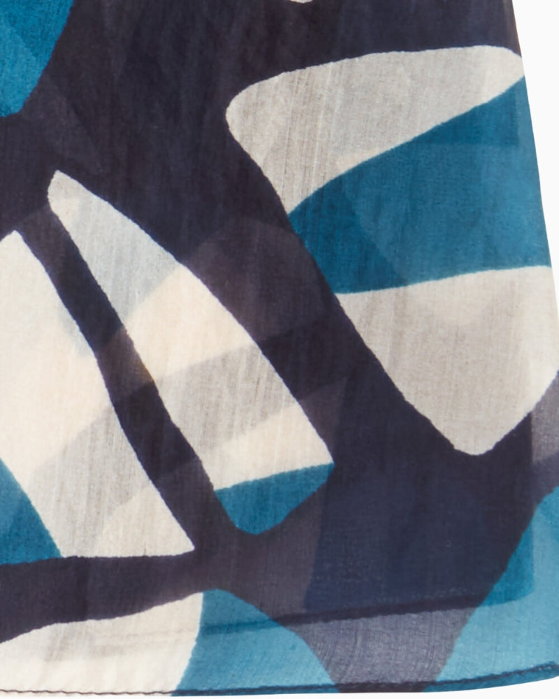 Detail view of lightweight silk scarf showing drape and pattern