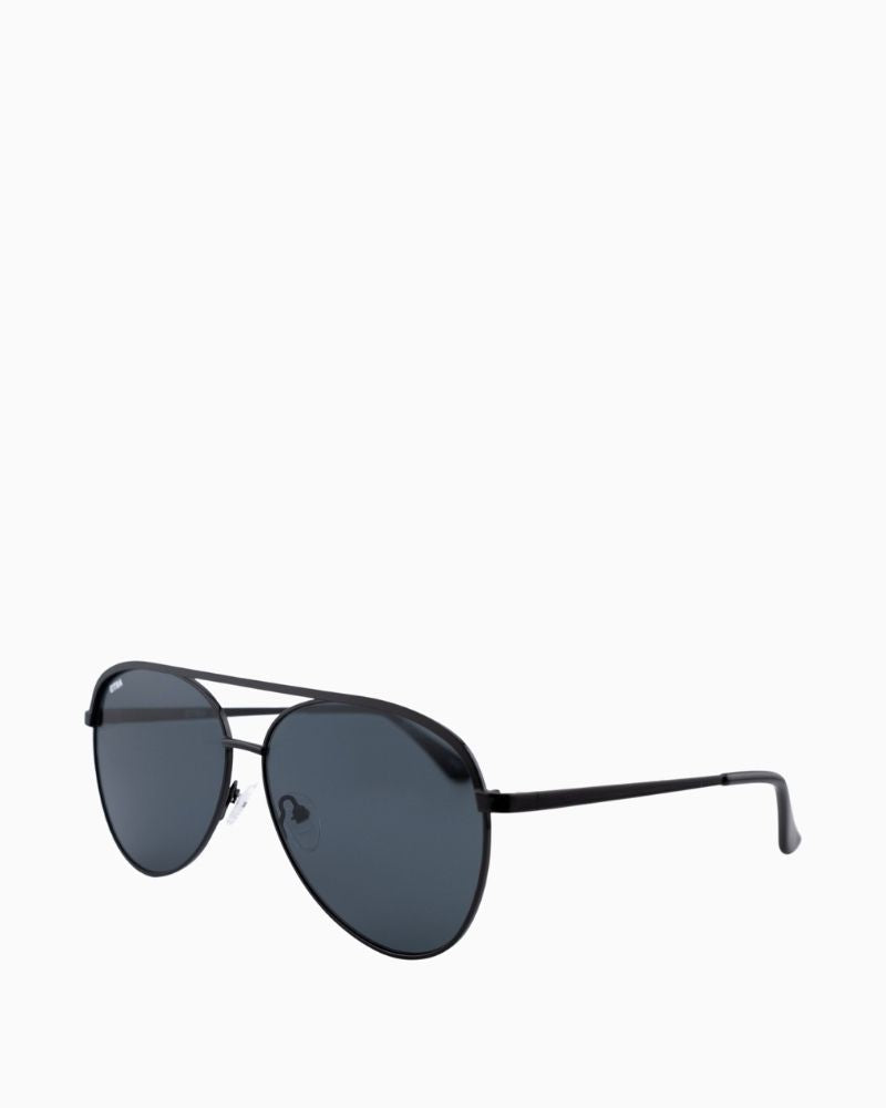 Side of Otra Charlie sunglasses with matte black rounded aviator frame and smoke lenses
