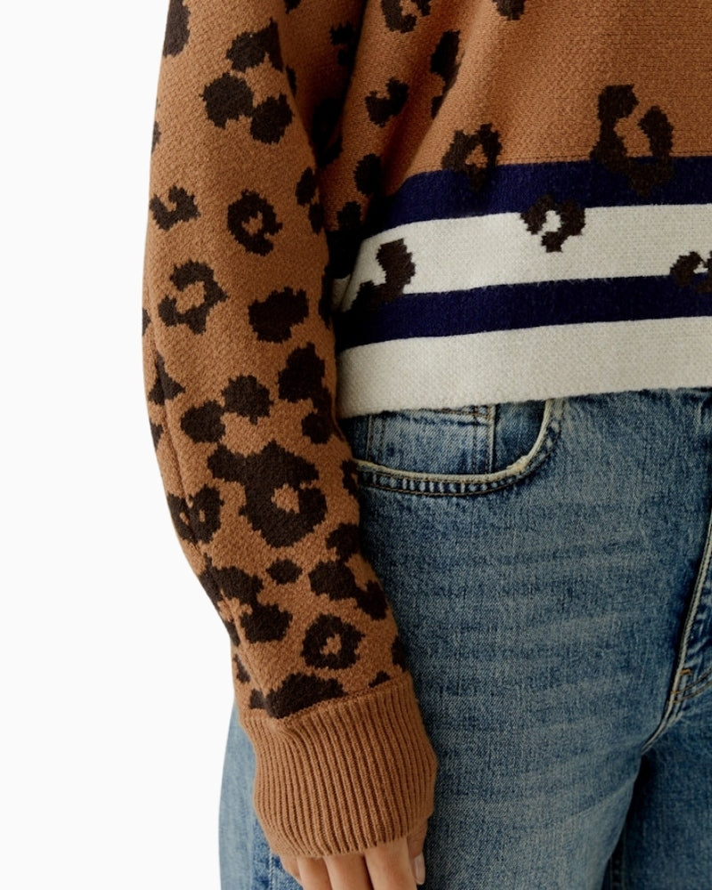 Close-up of rib-knit turtleneck and jacquard knit detail