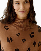 Close-up of rib-knit turtleneck and jacquard knit detail