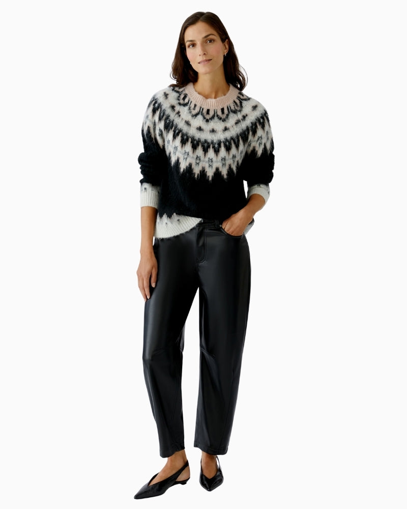 Oui black jumper styled casually with jeans and ankle boots