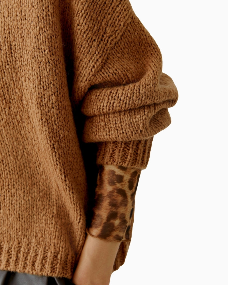 Close-up of mohair wool blend texture and clean neckline finish