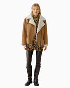 Oui Chasey dark brown leggings styled with long knit and boots