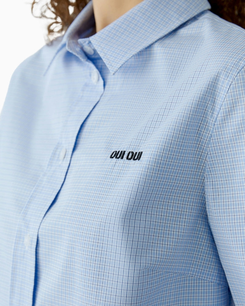 Close-up of Oui checked shirt blouse logo detail – Áines Boutique