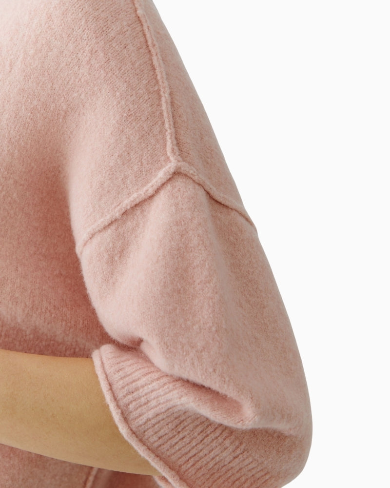 Close-up of Oui dusty rose pullover fabric and exposed seam detail – Áines Boutique