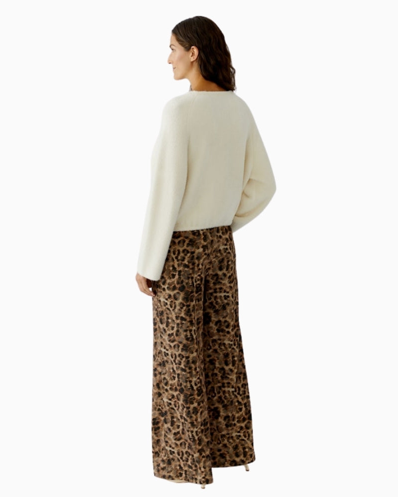 Back view of whitecap gray faux fur pullover with relaxed silhouette