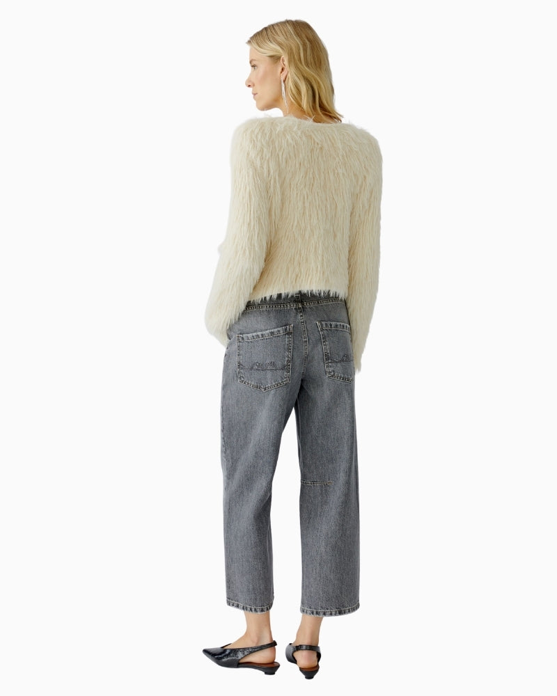 Side profile of open knit cardigan showing relaxed fit