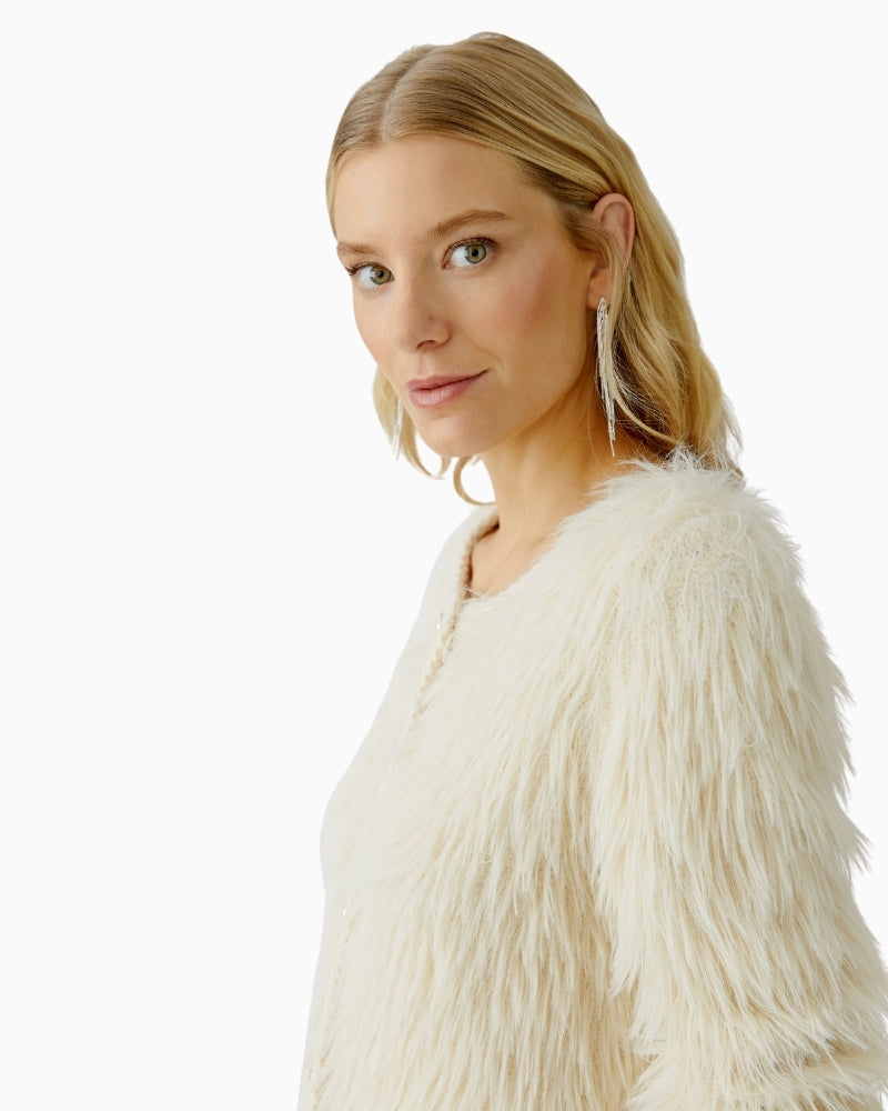 Close-up of fluffy texture and gentle drape in soft beige