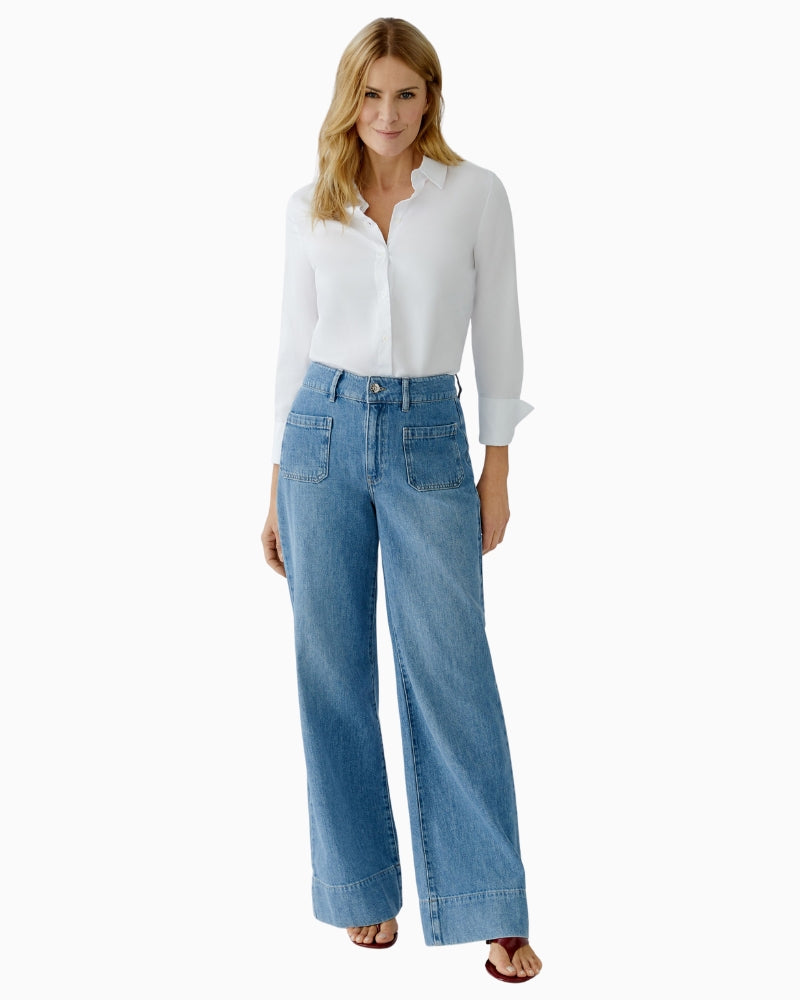 Woman wearing Oui wide-leg blue jeans, full outfit model view – Áines Boutique