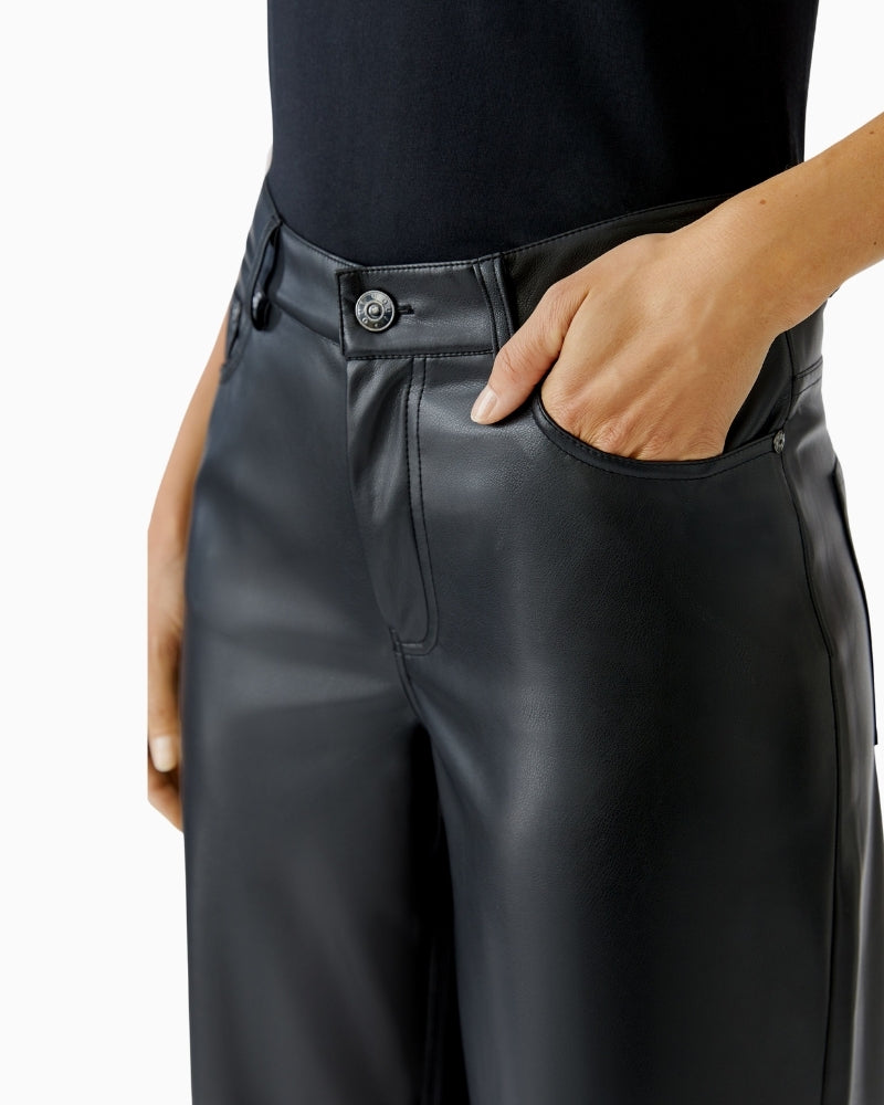 Close-up of waistband and texture on stretchy leather-look pants