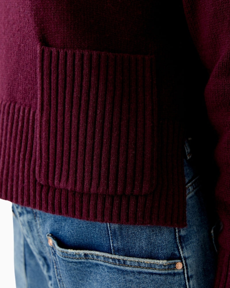 Close-up of ribbed hem with side slit on Oui bramble berry jumper