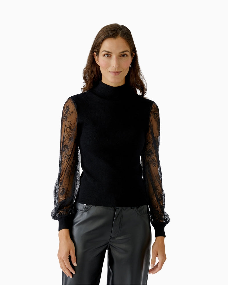 Front view of Oui black pullover with floral lace balloon sleeves