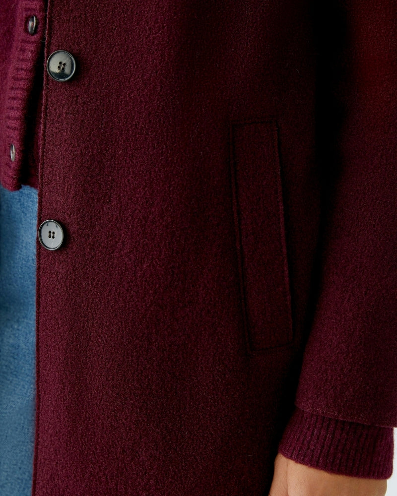 Close-up of Italian wool texture and tailored collar on Oui Mayson coat