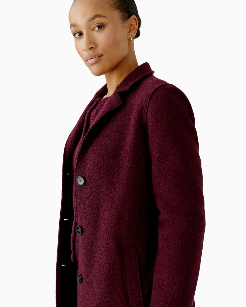 Close-up of Italian wool texture and tailored collar on Oui Mayson coat