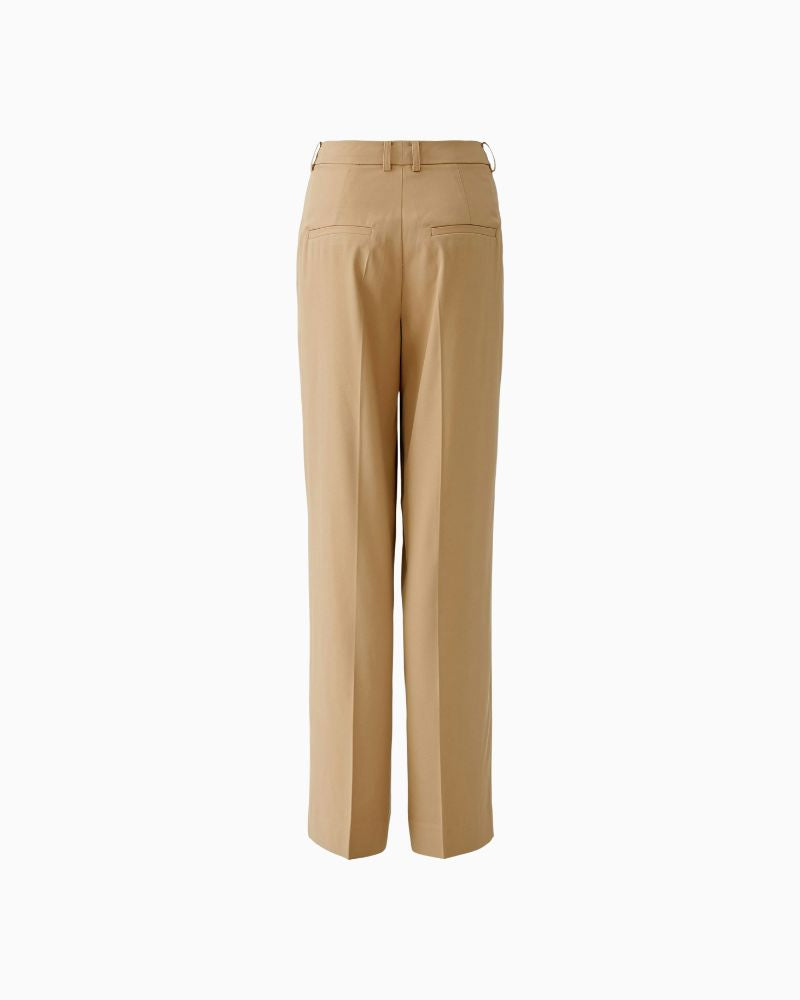 Back view of caramel trousers with decorative welt pocket and pleat detail