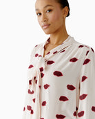 Close-up of viscose crepe fabric with playful print