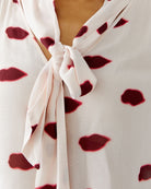 Close-up of viscose crepe fabric with playful print