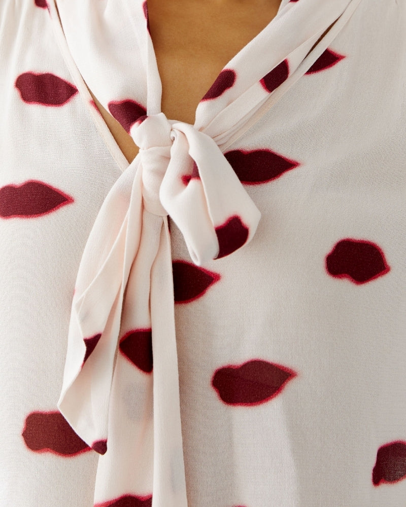 Close-up of viscose crepe fabric with playful print