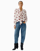 Oui rose red blouse with kissing mouth print and bow-tie neckline