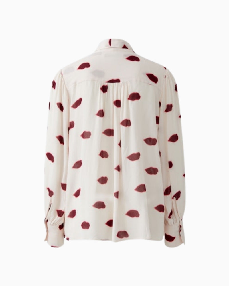 Back view of long sleeve blouse with shoulder gathers