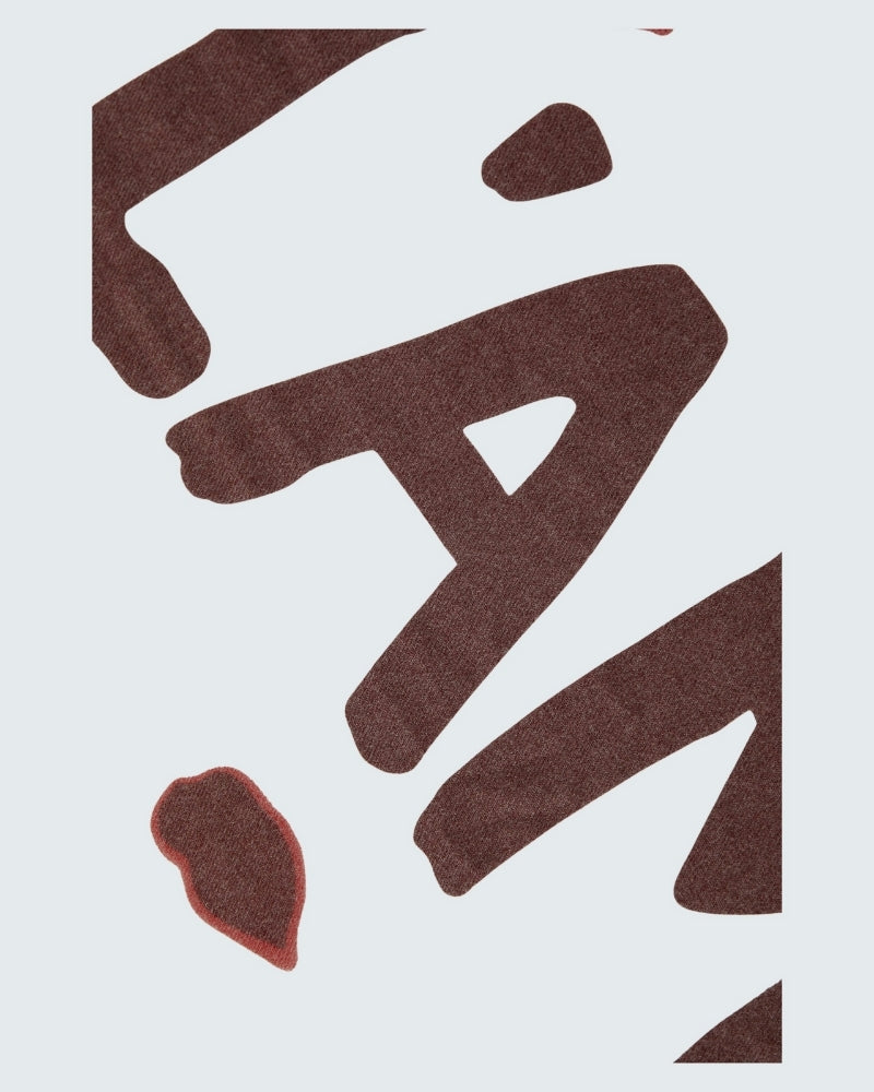 Front view of long red Oui scarf measuring 180cm by 60cm