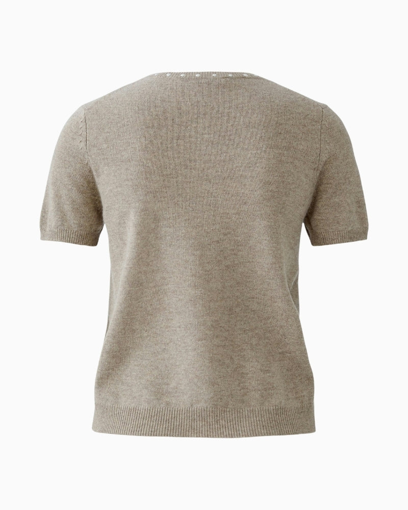 Back view of cropped wool blend pullover showing soft texture and fit
