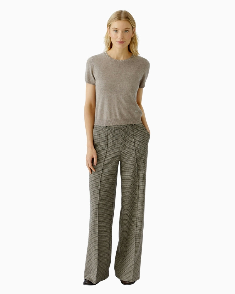 Pullover styled with high-waisted trousers in soft wool cashmere blend