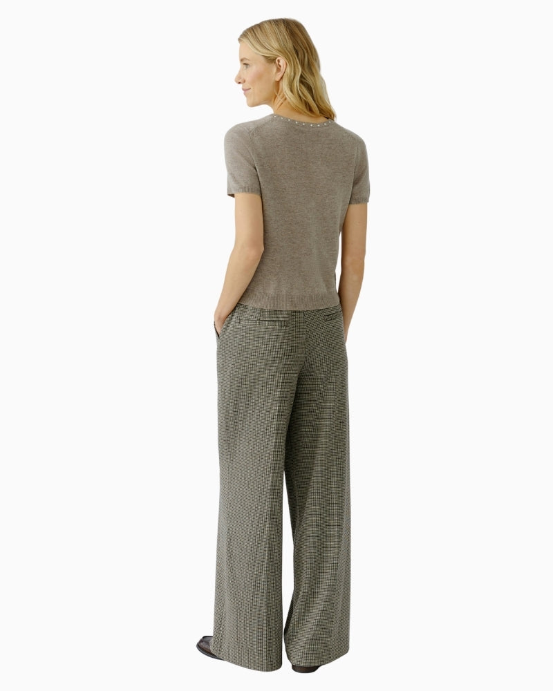 Back view of cropped wool blend pullover showing soft texture and fit