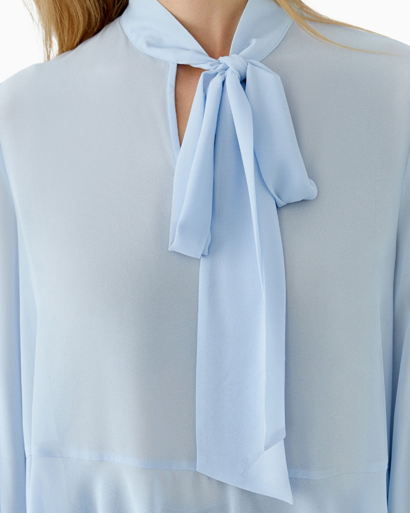Close-up of tie collar detail on Oui long-sleeve blue blouse