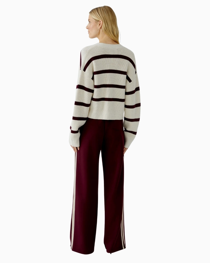 Back view of relaxed V-neck cardigan with dropped shoulders