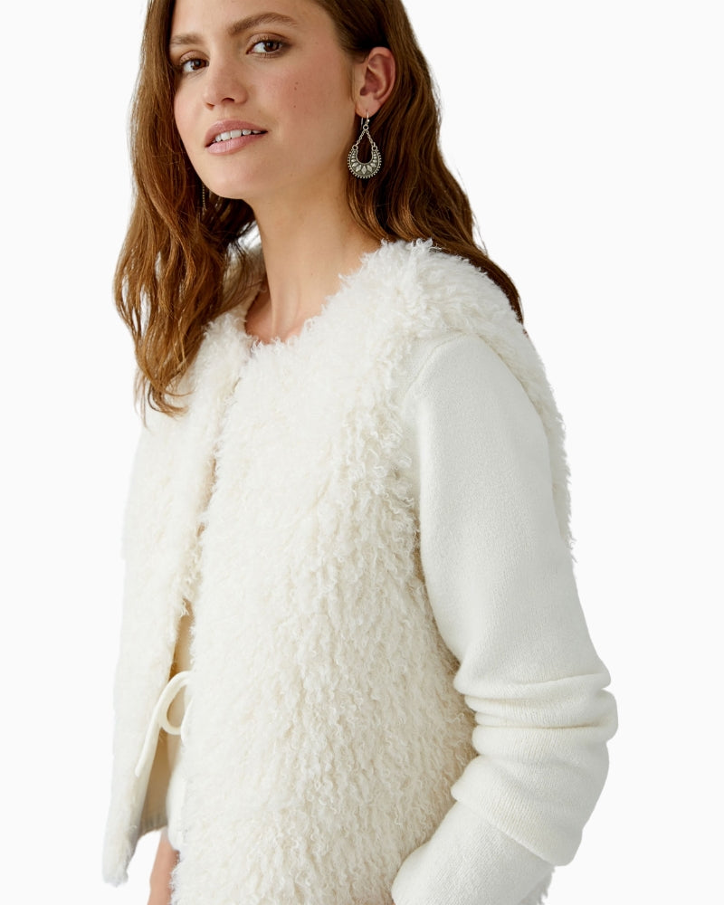 Detail of soft faux fur texture and tonal hooks