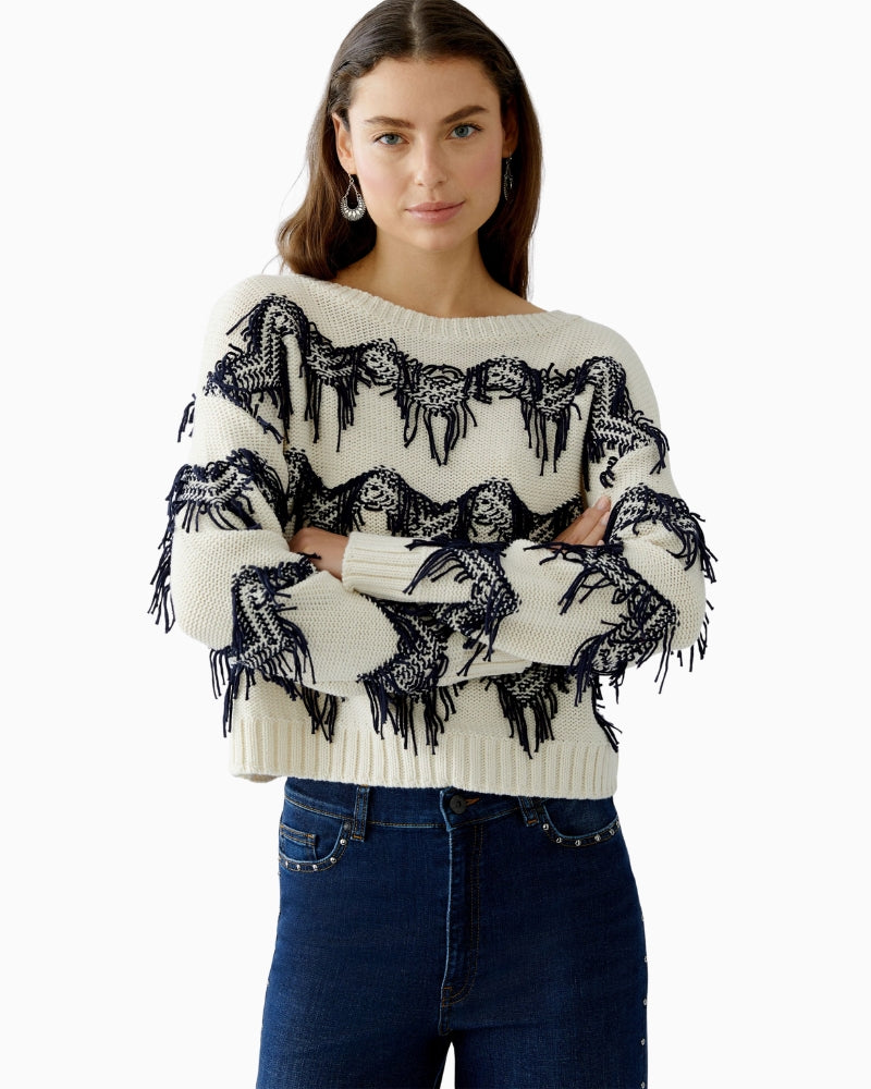 Texture view of hand-cut fringes and soft cotton fabric