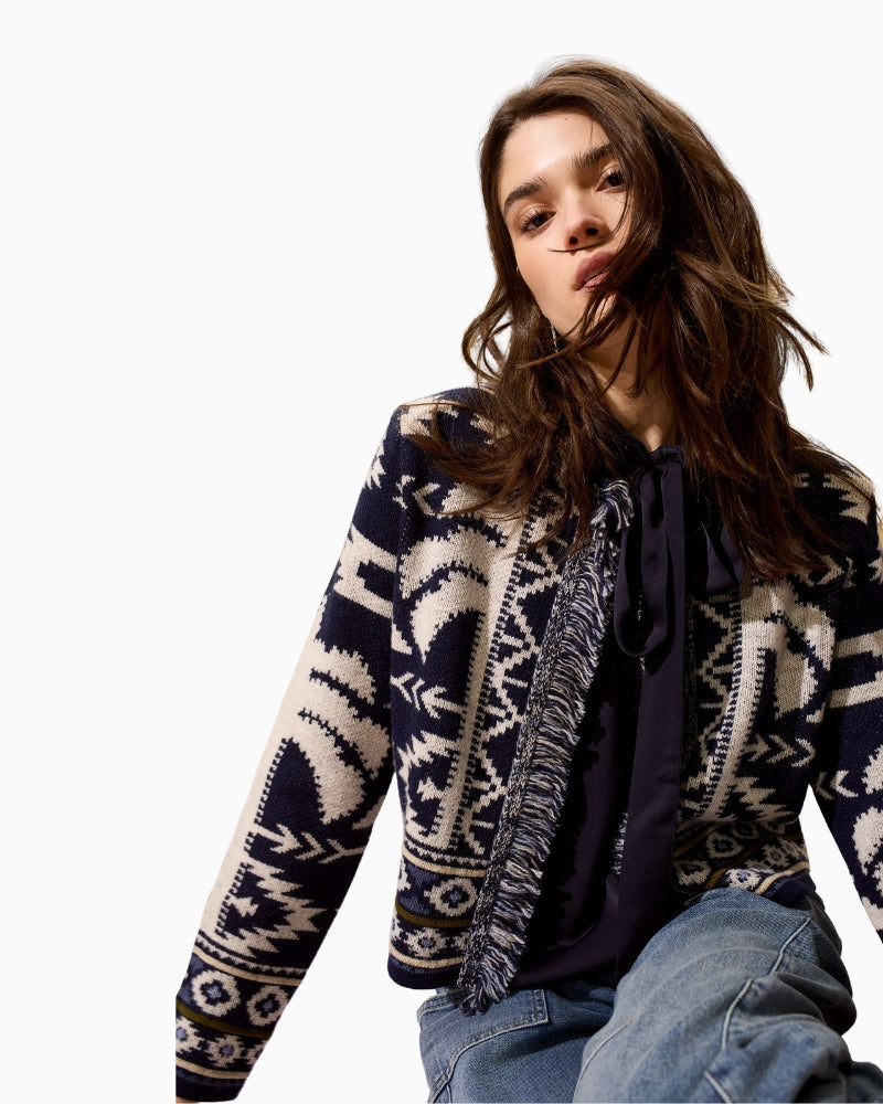 Side profile of fitted cardigan with soft shoulder pads