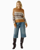 Model front view wearing Oui jacquard pullover in camel with jeans