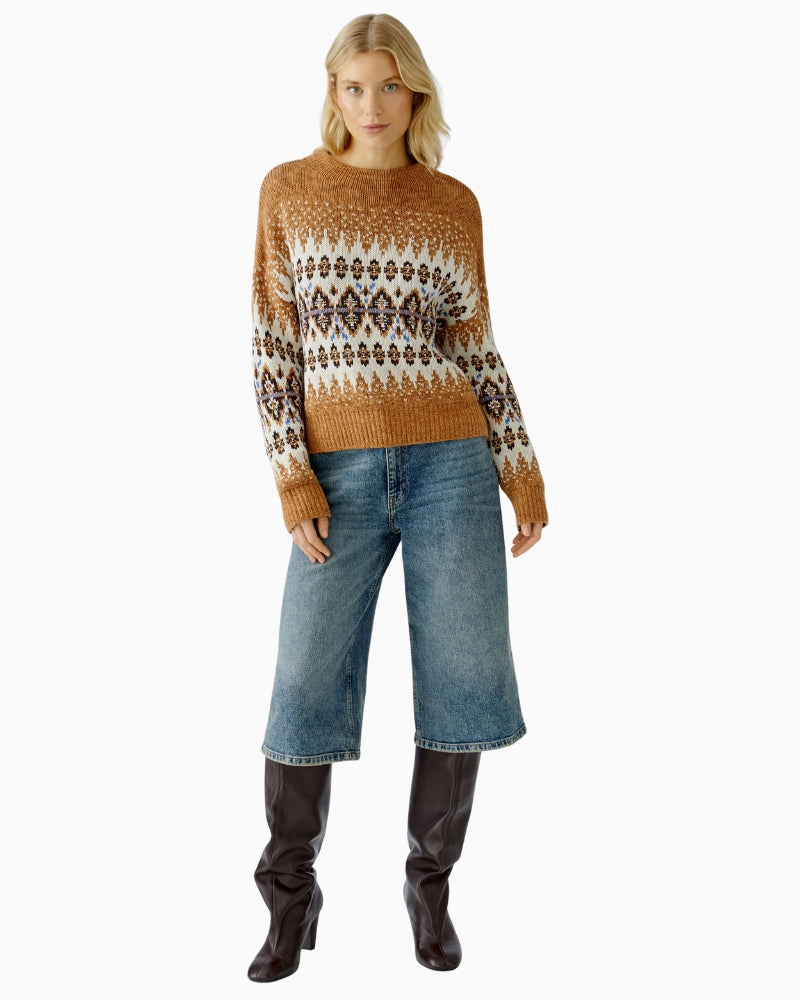 Model front view wearing Oui jacquard pullover in camel with jeans