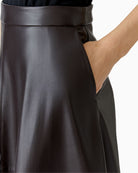Side view of Oui A-line skirt showing flared cut and pocket detail