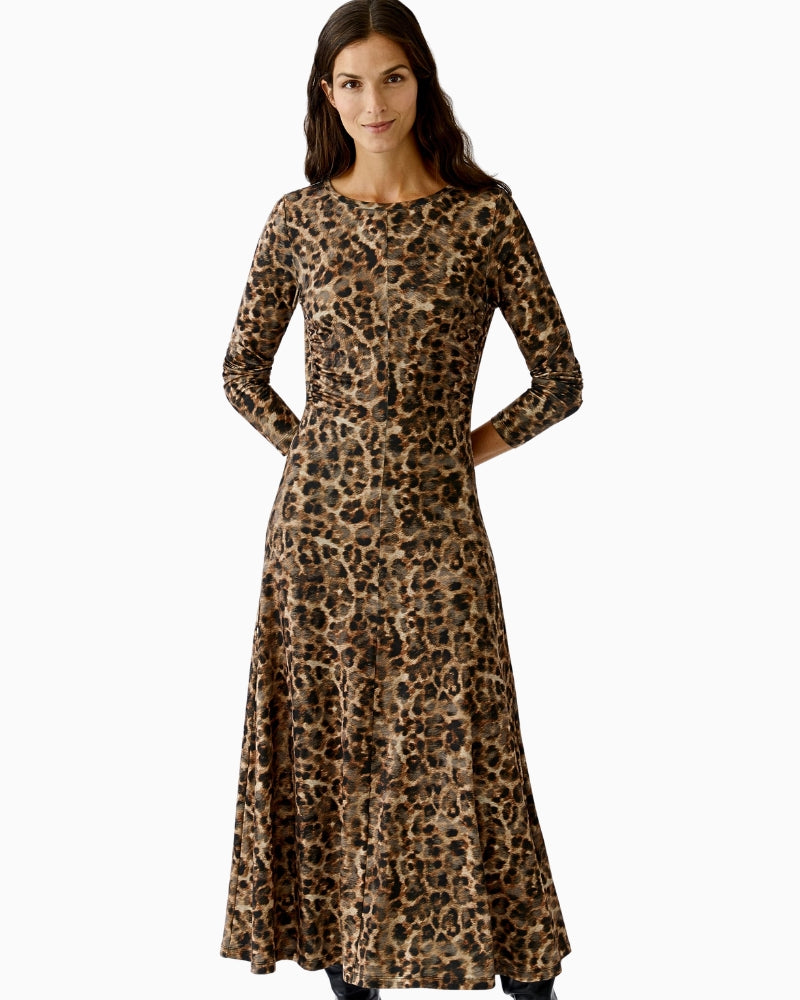 Oui Leo maxi dress styled with boots for chic evening look