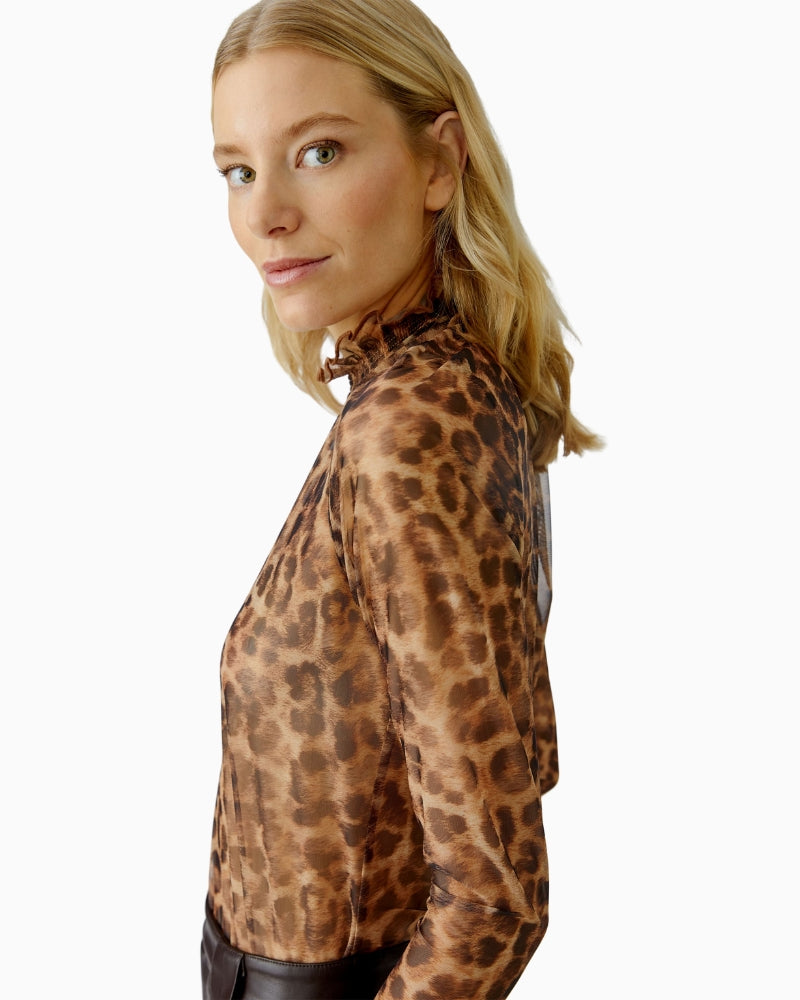 Model side view of Oui leopard mesh shirt showing sheer fabric and straight cut