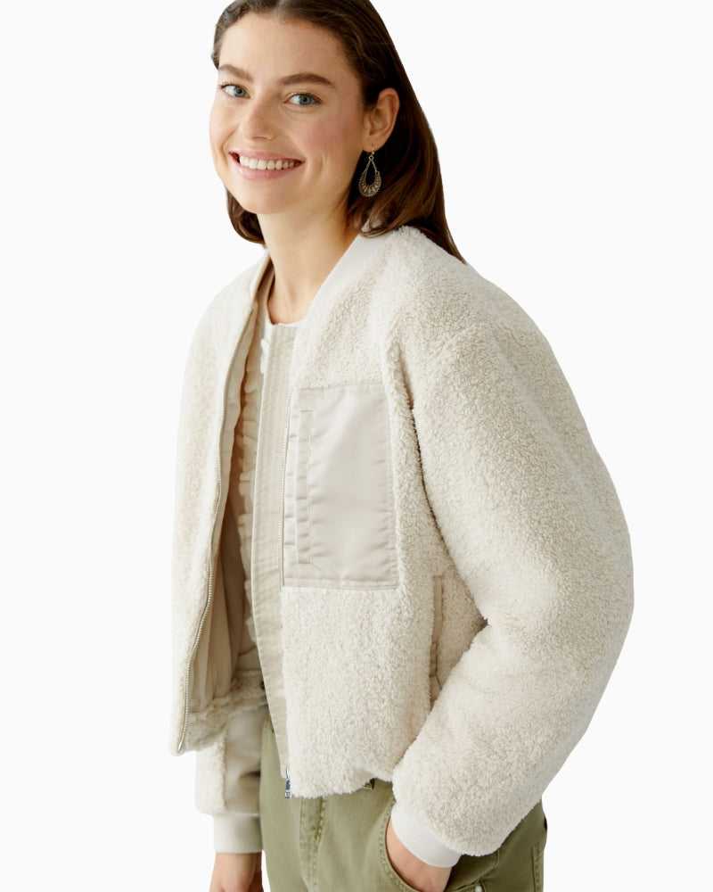 Side view showing relaxed fit and adjustable hem