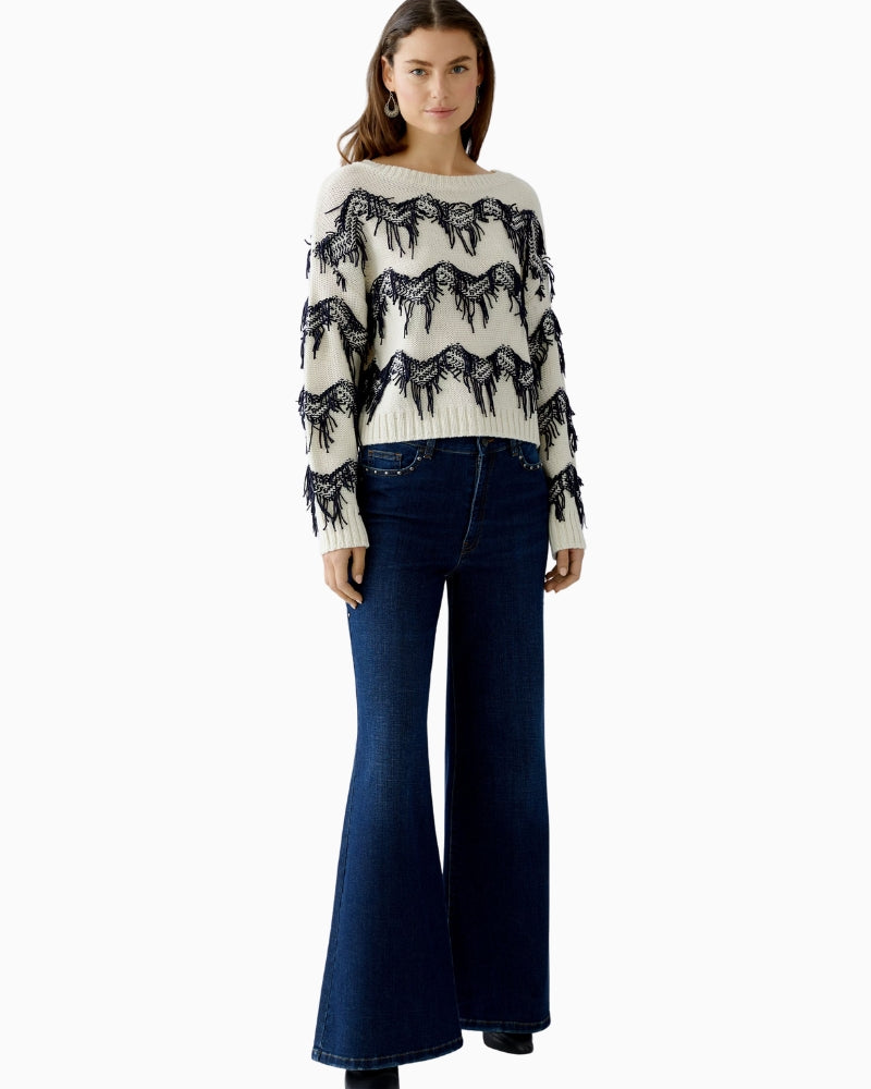 Side view of extra-long wide leg jeans by Oui with classic fit